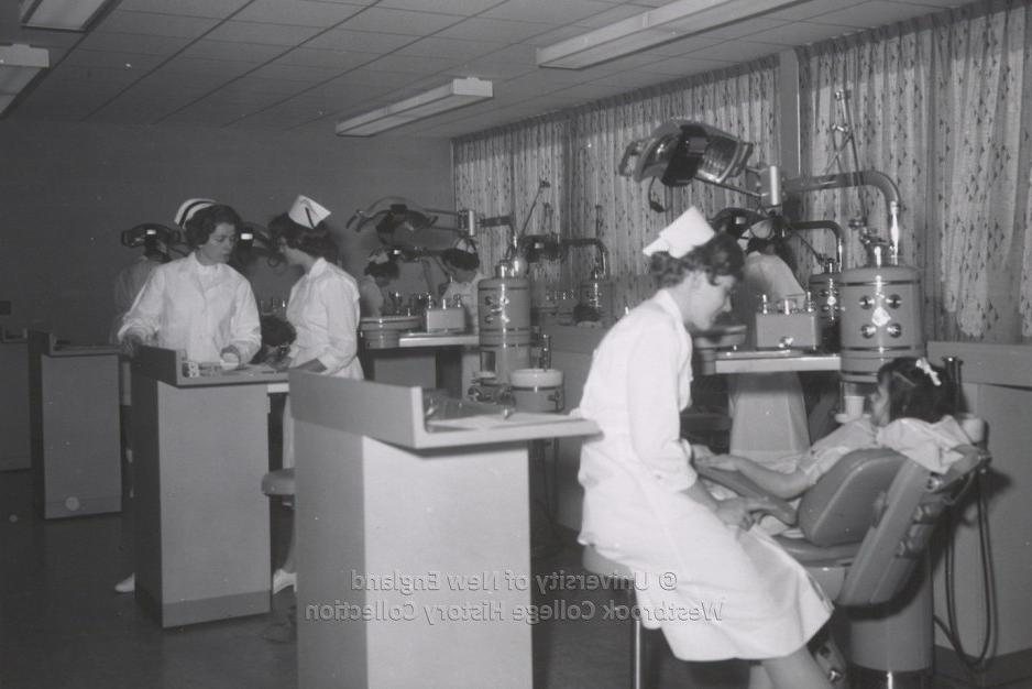 A historical black and white photo of nursing students